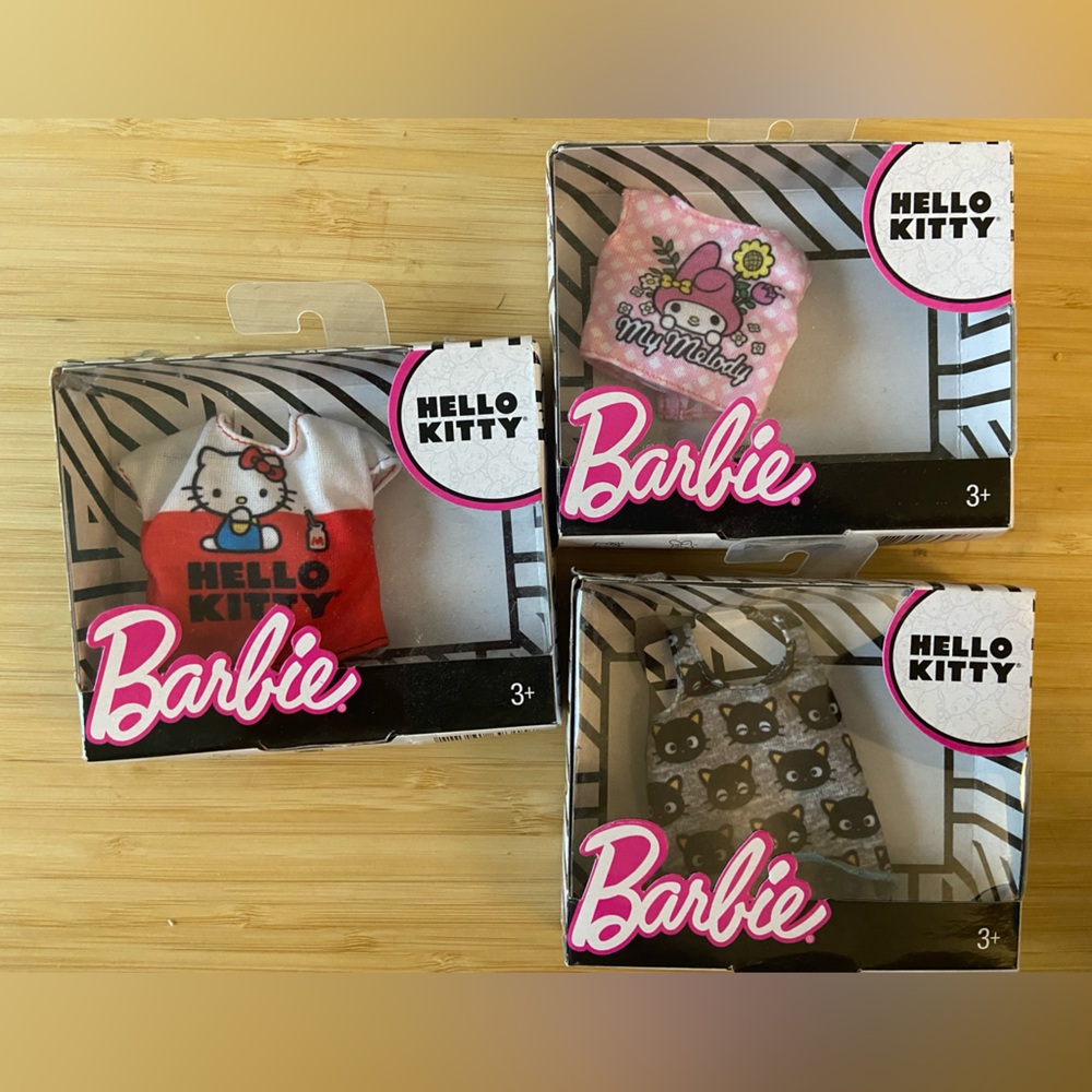 A set of 3 Hello Kitty themed Barbie T-shirt for a Barbie doll.